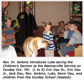 Rev. Dr. Jenkins introduces Luke during the Children&rsquo;s Sermon at the Beemerville Service on Sunday Oct. 7th.  (L to R) Eric Dau Sr., Eric Dau Jr., Jack Dau, Rev. Jenkins, Luke, Kevin Dau, and children from the Sunday School (Seated). 