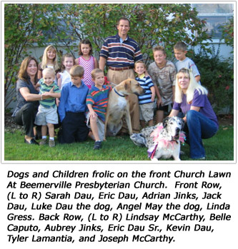 Dogs and Children frolic on the front Church Lawn At Beemerville Presbyterian Church.  Front Row, (L to R) Sarah Dau, Eric Dau, Adrian Jinks, Jack Dau, Luke Dau the dog, Angel May the dog, Linda Gress. Back Row, (L to R) Lindsay McCarthy, Belle Caputo, Aubrey Jinks, Eric Dau Sr., Kevin Dau, Tyler Lamantia, and Joseph McCarthy.